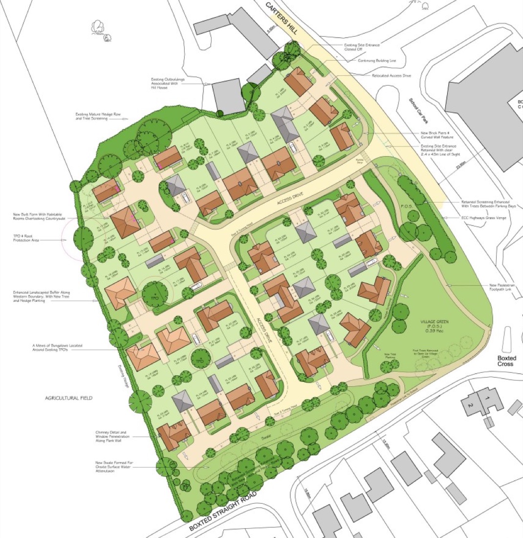 Residential layout showing access roads, homes, parking and green spaces